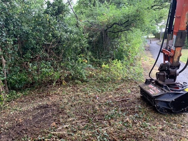 Excavator and flail mower