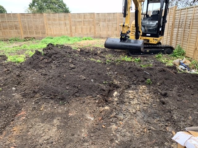 Digging off the topsoil for the car park extension